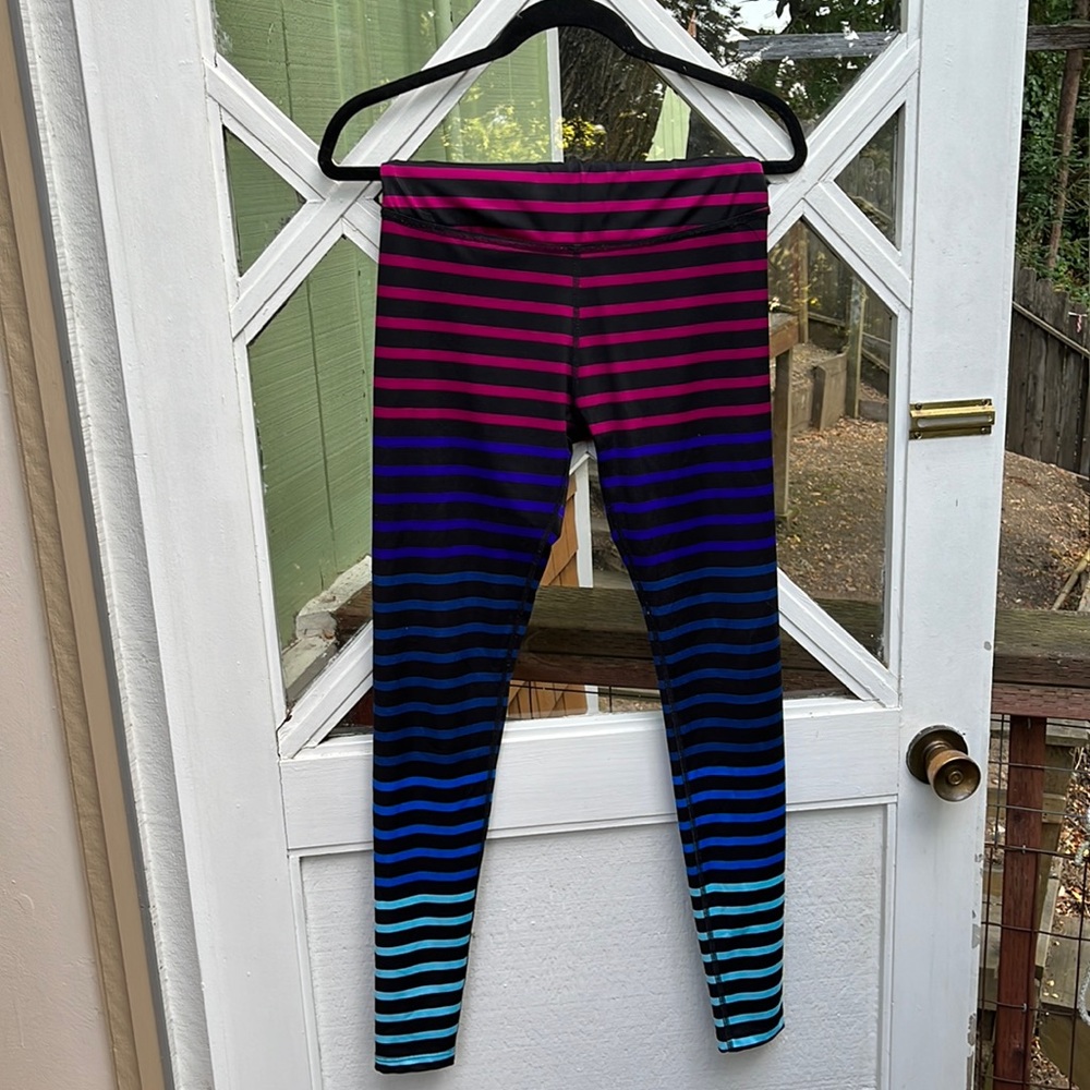 Beyond Yoga high waisted leggings size large multicolored horizontal strips. OBO